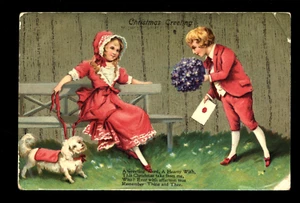 VINTAGE CHRISTMAS GREETING POSTCARD YESTERYEAR CHILDREN WEAR DARK PINK CLOTHES - Picture 1 of 1