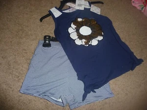 NEU NEU MIT ETIKETT POOF Mädchen Größe 5/6 hübsches Pailletten Gänseblümchen Short Set - Bild 1 von 1