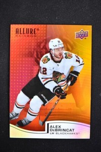 2021-22 UD Allure Rainbow Red-Orange #R-62 Alex DeBrincat - Chicago Blackhawks