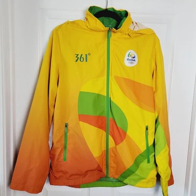 Chaqueta cortavientos Rio 2016 para hombre mediana voluntaria con capucha cremallera amarilla 360 Foto 1 de 4