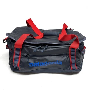 Bolso de Lona Patagonia Agujero Negro 40L Mochila de Viaje Equipaje de Mano - Azul Ardiente con Rojo - Imagen 1 de 3