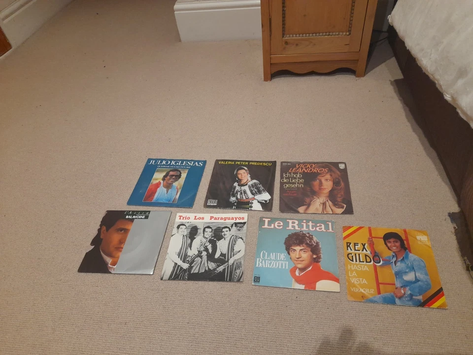 Collection of 7 World Music 7" vinyl Records Italian French Spanish Romanian - Image 1 of 1