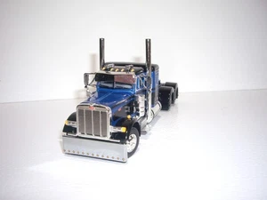 DCP FIRST GEAR 1/64 BLACK AND BLUE PETERBILT 379 WITH 36" SLEEPER - Picture 1 of 5