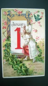 Antigua Postal en Relieve 1910 "1 de enero te deseo un feliz año nuevo" - Imagen 1 de 4