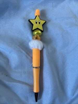 This Crafted Pen Is The Super Star From Mario Bros - Image 1 of 3