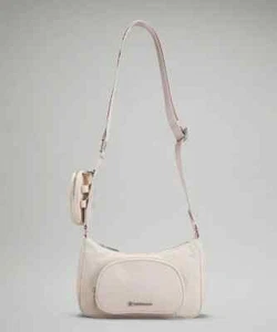 NUOVA borsa a tracolla Lululemon con nano pochette 2L bianco avorio - Foto 1 di 9