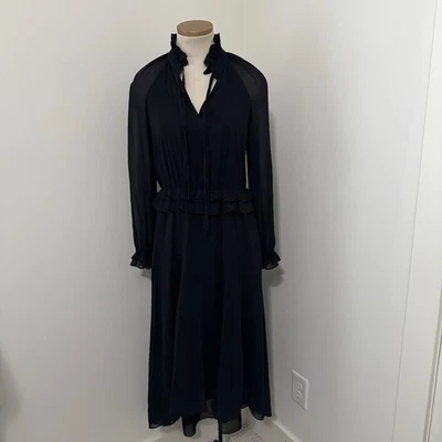 Vestido midi negro pequeño Banana Republic OLIVIA PALERMO caprichoso hada oscura Foto 1 de 4