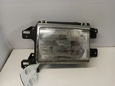 Faro delantero izquierdo conductor con moldura cromada de Ford F250 1989 12530219 Foto 1 de 4