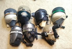 Lot Of 7 Vintage ZEBCO Fishing Reels Reel Model DD, 20/20 And 202 - Picture 1 of 12