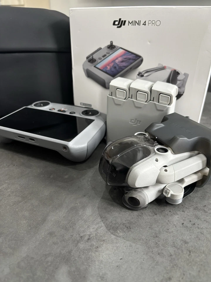 DJI Mini 4 Pro Fly More Combo Camera Drone RC2 Controller Great Condition - Image 1 of 4