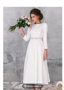 Ivory wedding dress size 8, calf length, three quarter sleeves, never worns - Picture 1 of 7