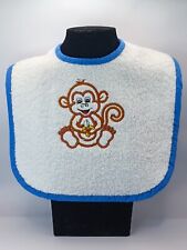 bib in terry cloth embroidered with a cute design
