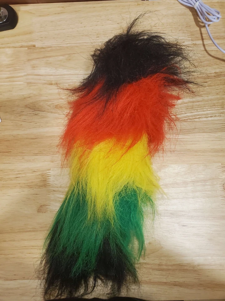 Cola de cinturón multicolor Foto 1 de 3