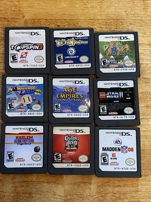 Nintendo DS Game Lot- Bomberman Land, Viva Pinata, Rayman, Topspin, Guitar Hero - Image 1 of 3