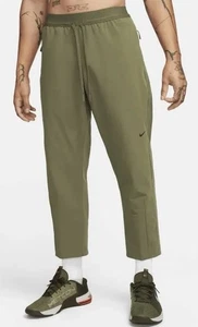 NEW Size M- Nike Standard Fit Versatile Adv Woven Green Pants FN3014-222 - Picture 1 of 3