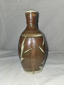 Handcrafted Brown Ceramic Vase with Abstract White Design - Picture 1 of 8