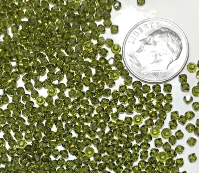 Swarovski® Crystal XILION Bicone Beads #5328 - 2.5mm - OLIVINE - Factory Package - Image 1 of 4