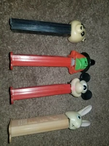 4 Vintage PEZ Dispensers - The Witch and Mickey Mouse - bunny pig - Bild 1 von 8