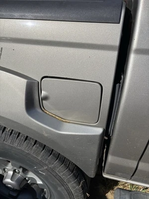 98 99 00 01 02 03 04 NISSAN FRONTIER Fuel Tank Door - Image 1 of 4