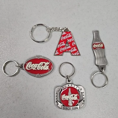 Vintage Lot of 4 Coca Cola Keychains - Image 1 of 4