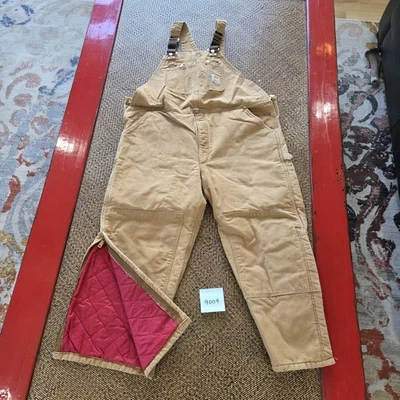Mono con tirantes Carhartt para hombre marrón pato lona acolchado forrado doble rodilla ropa de trabajo Foto 1 de 4