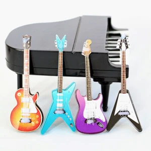 Mini guitarra eléctrica 1:12 instrumento musical casa de muñecas sala de música bajo de plástico - Imagen 1 de 9
