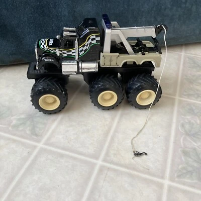Camión de remolque Tonka Hasbro 2003 de servicio en carretera negro a cuadros bandera gráfico Foto 1 de 4