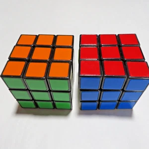 JUEGO DE 2 ROMPECABEZAS TEASER CEREBRAL ORIGINALES RUBIK DE 2,25 - Imagen 1 de 7