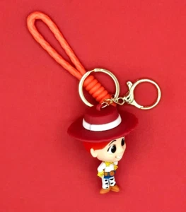 JESSIE DISNEY TOY STORY SCHLÜSSELANHÄNGER MIT ABNEHMBARER HANDSCHLAUFE - Bild 1 von 2