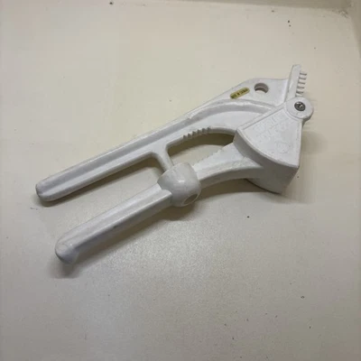 🍋 Prensa exprimidora de ajo de colección herramienta de cocina de plástico blanco - Hecha en Taiwán Foto 1 de 4