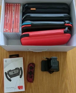Nintendo Switch Accessories Bundle - Empty Game Cases, F1 Racing Wheel, Joycon - Afbeelding 1 van 6