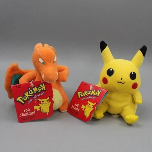 Vintage 1998 Hasbro Nintendo Pokémon Charizard #06 & Pikachu #25 Beanie Plüsch Neu mit Etikett - Bild 1 von 9