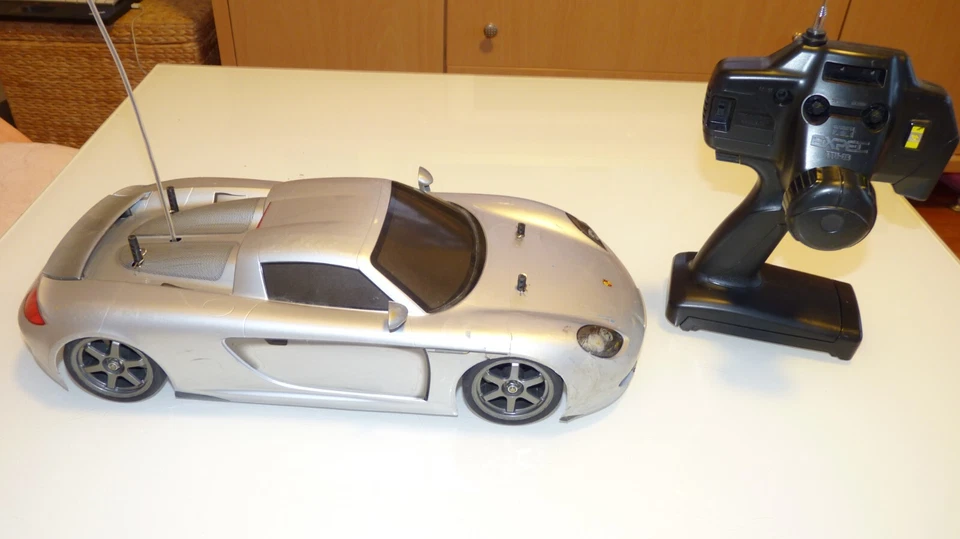 Tamiya 1/10 Porsche Carrera GT TT-01 Chassis With Remote ARR - Image 1 of 4