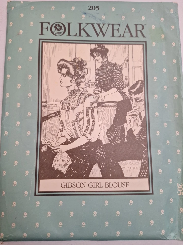Blusa Gibson Menina Flowy Top Fantasia Folkwear 205 Padrão de Costura Antigo Gola Alta - Imagem 1 de 4