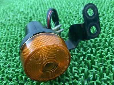 Señal de giro delantero derecho Suzuki RMX250S 35600-10 pieza original motocicleta SJ14... Foto 1 de 4