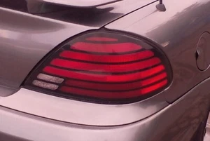 1999 - 2005 PONTIAC GRAND AM PASSENGER SIDE TAIL BRAKE LIGHT RIGHT SIDE - Bild 1 von 1