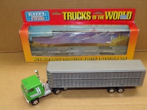 ERTL TRUCKS OF THE WORLD INTERNATIONAL TRANSTAR II WITH LIVESTOCK VAN #1424 - Picture 1 of 4
