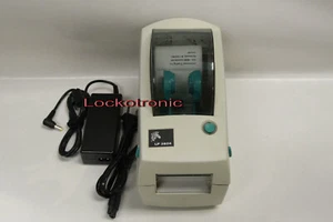 Impresora térmica de etiquetas de código de barras Zebra LP2824 USB/serie SIN cubierta frontal - Imagen 1 de 3