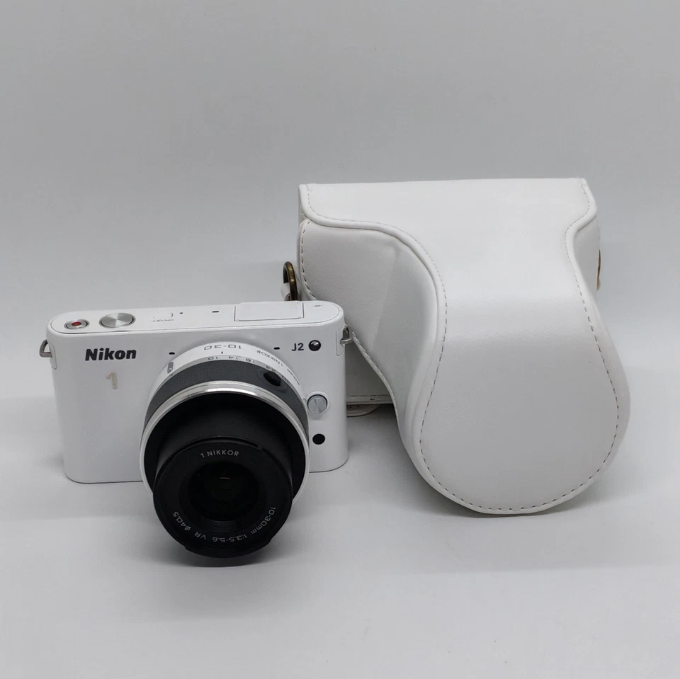Funda de cuero para Nikon J1 J2 con bolsa de cámara Lnes de 10-30 mm / 30-110 mm correa de agarre Foto 1 de 1