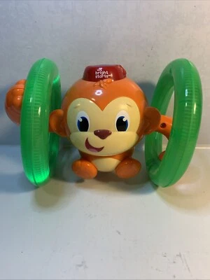 Bright Starts “Roll & Glow Monkey Toy” com luzes e melodias, idade 6 meses+ - Imagem 1 de 4