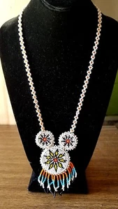 VINTAGE SEED BEAD MEDALLION NECKLACE. LEATHER BACK - Picture 1 of 6