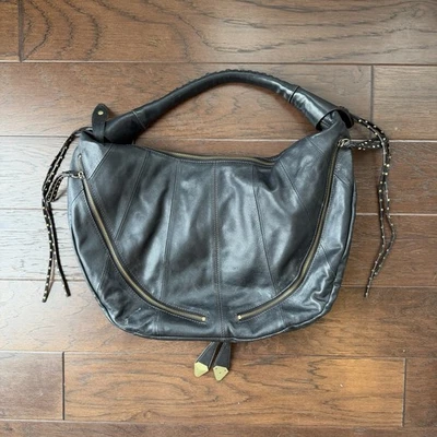 Bolso Hobo OrYANY X Free People Jazmín Cuero Negro Flecos Grandes Tachonado Foto 1 de 4