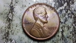 (Sept25) 1957 P Error Die Chip (BIE) - Picture 1 of 3