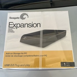 Seagate Expansion 1TB External Storage Drive ST310005EXA101-RK) SEALED! - Afbeelding 1 van 6