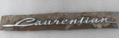 1964 PONTIAC LAURENTIAN FENDER EMBLEM BADGE GENUINE OEM GM CANADA CDN ORIGINAL - Image 1 of 4