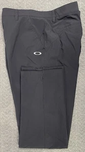 Pantalones negros OAKLEY para hombre talla 38x30 "se ajustan como 39x30" - Imagen 1 de 20