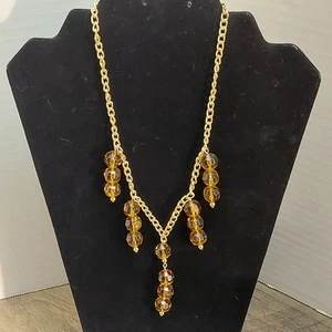 Collana tono oro 17" con perline in vetro ambrato sfaccettato chiusura a levetta - Foto 1 di 8