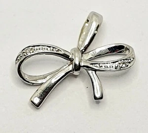 Small 9ct White Gold Diamond Bow Pendant - Picture 1 of 9