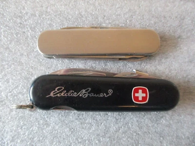 VICTORINOX SWISS ARMY EDDIE BAUER + STAINLESS STEEL MULTI-FUNCTION POCKET KNIVES - Image 1 of 4