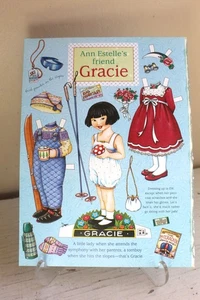Uncut Paper Doll Full Page Mary Englebreit Gracie at Symphony and Skiing - Picture 1 of 1